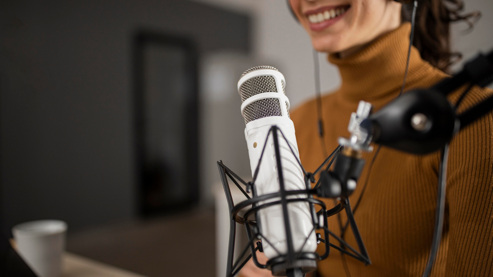 woman using a microphone to record for ivr